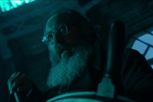 Ultron takes over Vision: a bearded Ultron in glasses grips the wheel inside Vision’s mind in VisionQuest